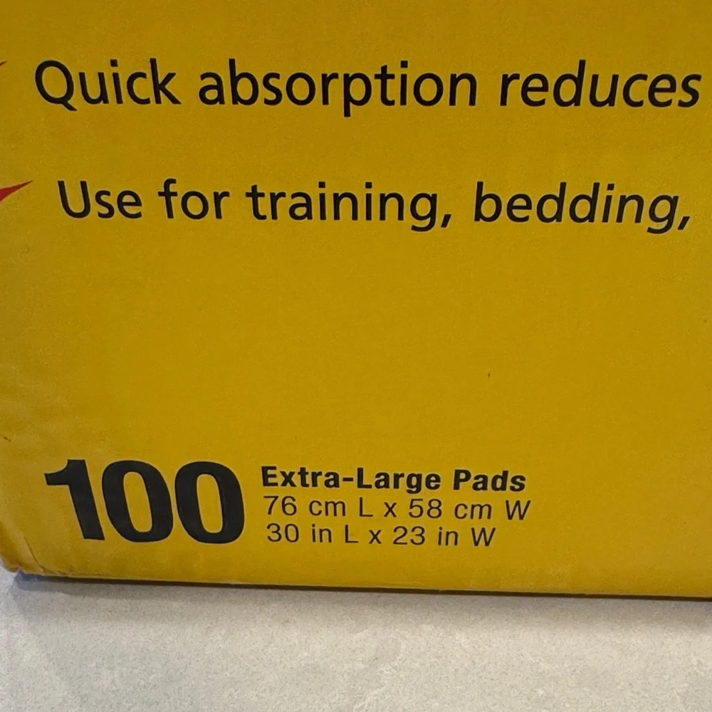 Kirkland Signature Extra-Large Absorbent Pads only a couple pads missing 1 pack.